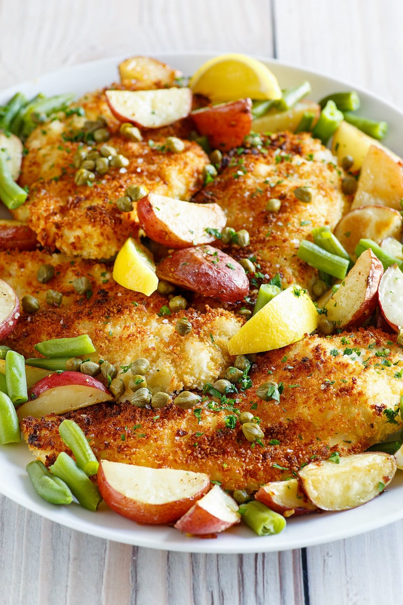 Crispy Chicken Schnitzel recipe from RecipeGirl.com #crispy #chicken #schnitzel #sheet #pan #sheetpan #dinner #recipe #RecipeGirl #weight #watchers #weightwatchers #freestyle #smartpoints #freestylesmartpoints #wwfreestyle Crispy Chicken Schnitzel