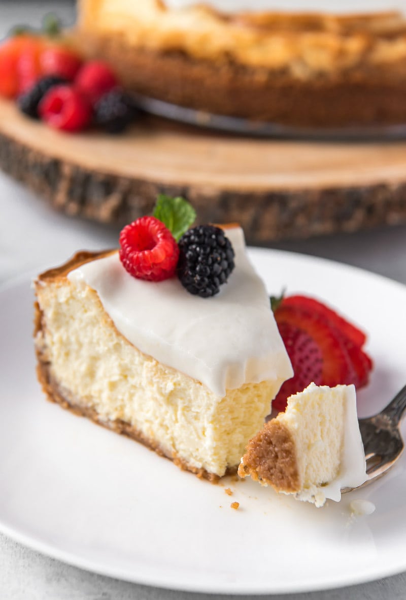 Slice of New York Style Cheesecake with fresh berries