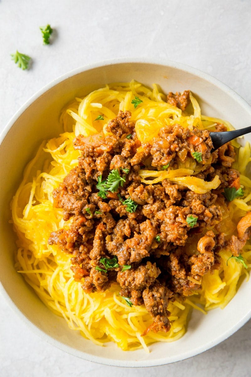 Paleo Spaghetti Squash Bolognese recipe from RecipeGirl.com #paleo #spaghetti #squash #spaghettisquash #bolognese #recipe #RecipeGirl Bowl of Paleo Spaghetti Squash Bolognese