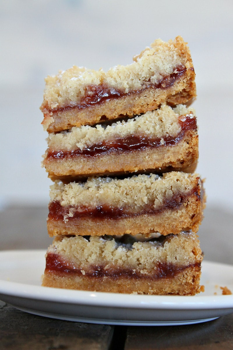 stack of Strawberry Shortbread Bars on a white plate
