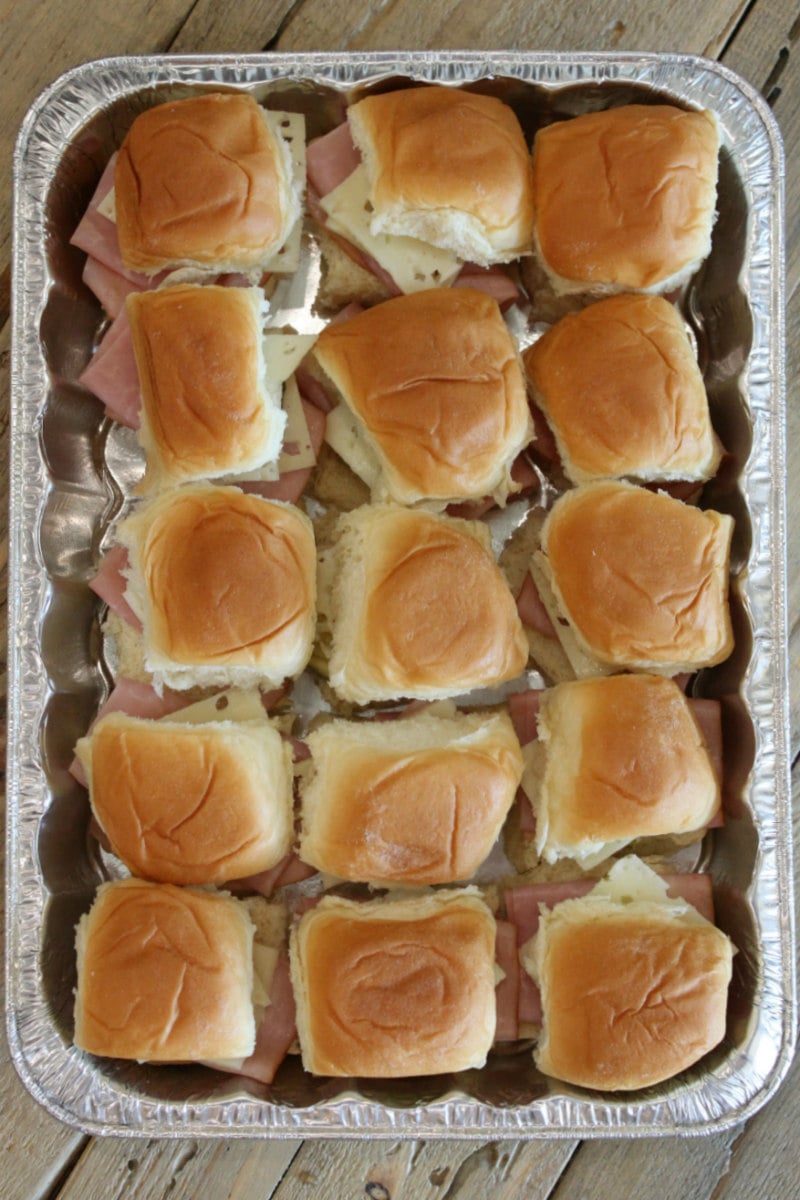 overhead shot of a pan of cuban sliders ready for the oven