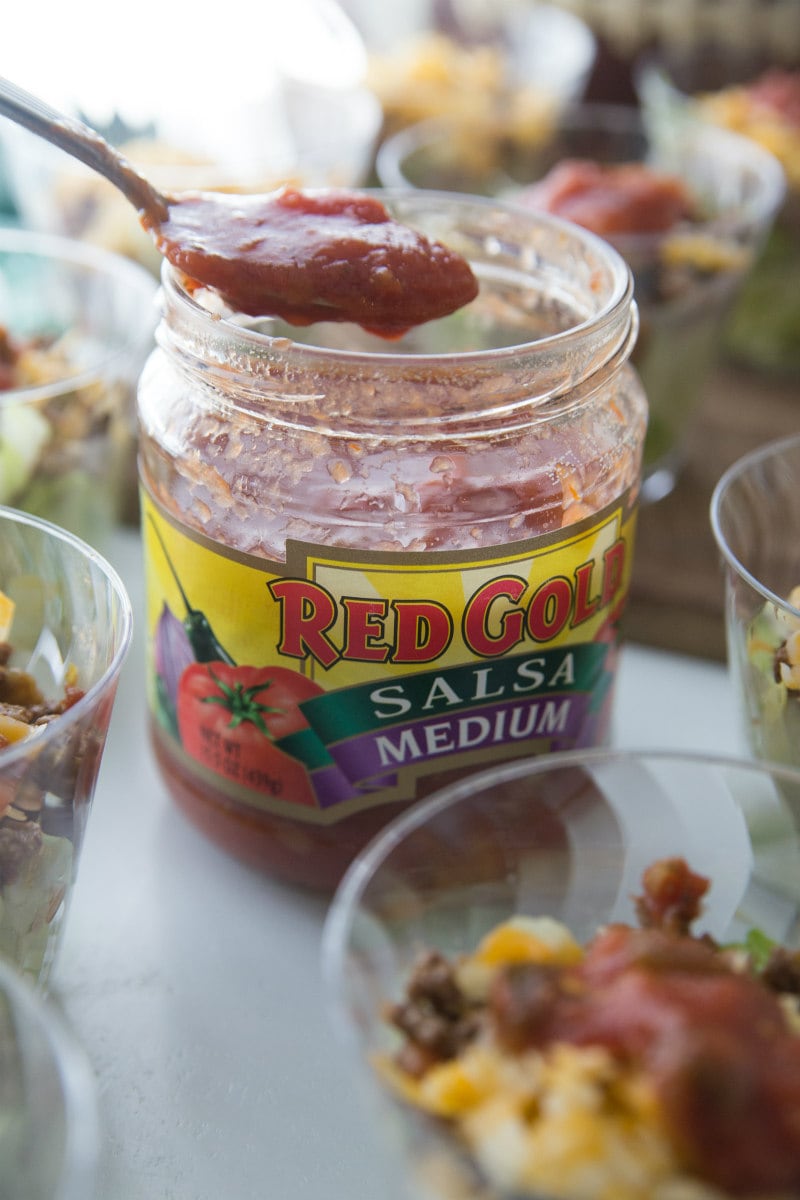 Adding salsa to Easy Taco Salad Cups