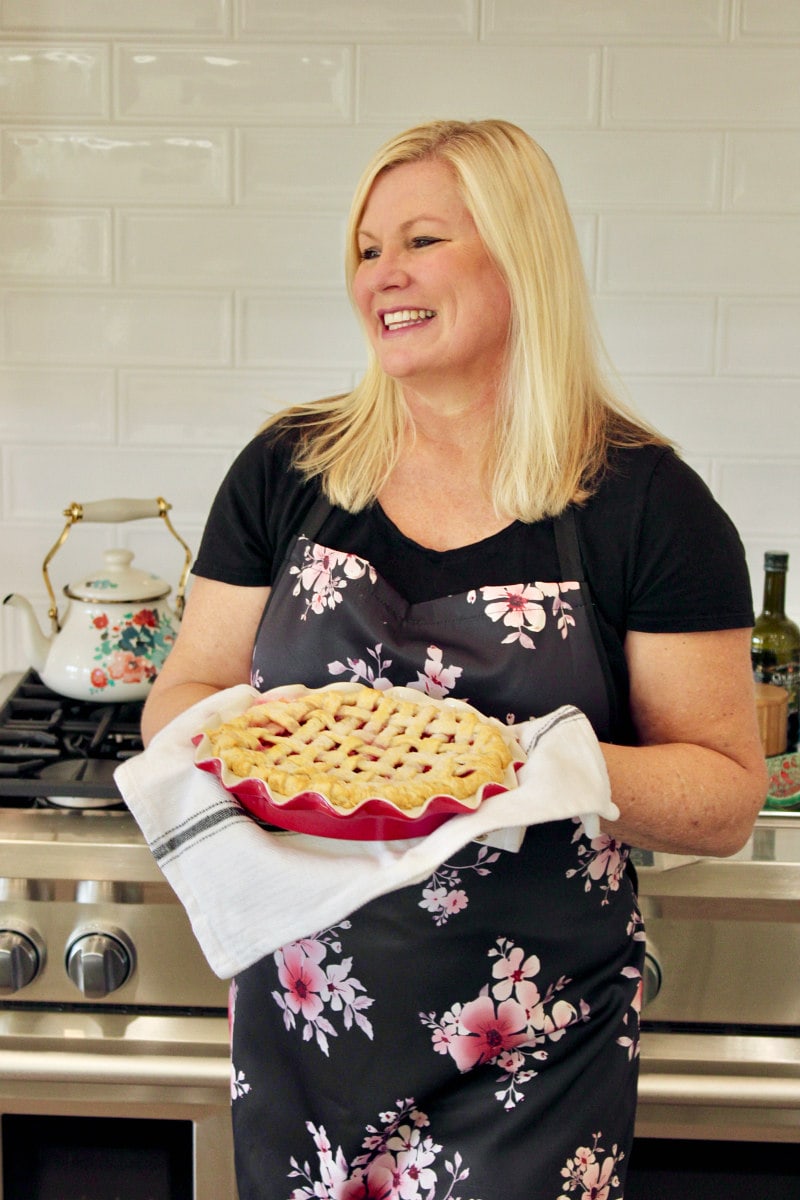 RecipeGirl holding a Cranberry Pie