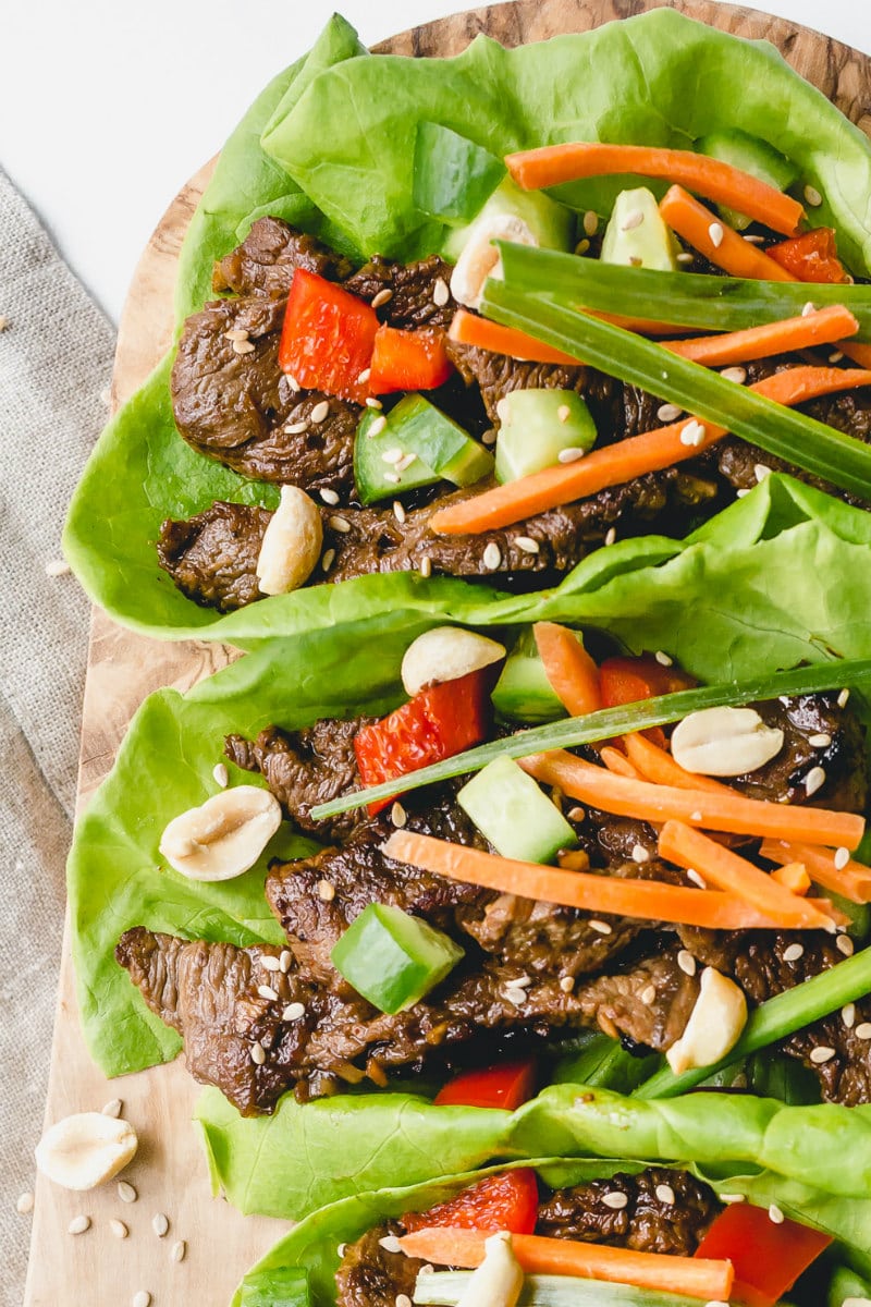 Bulgogi Beef Lettuce Wraps recipe from RecipeGirl.com #Bulgogi #korean #beef #lettuce #wraps #recipe #RecipeGirl close up of beef lettuce wraps