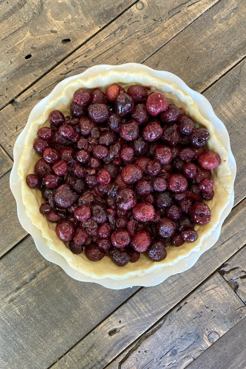 overhead shot of cherries in pie crust