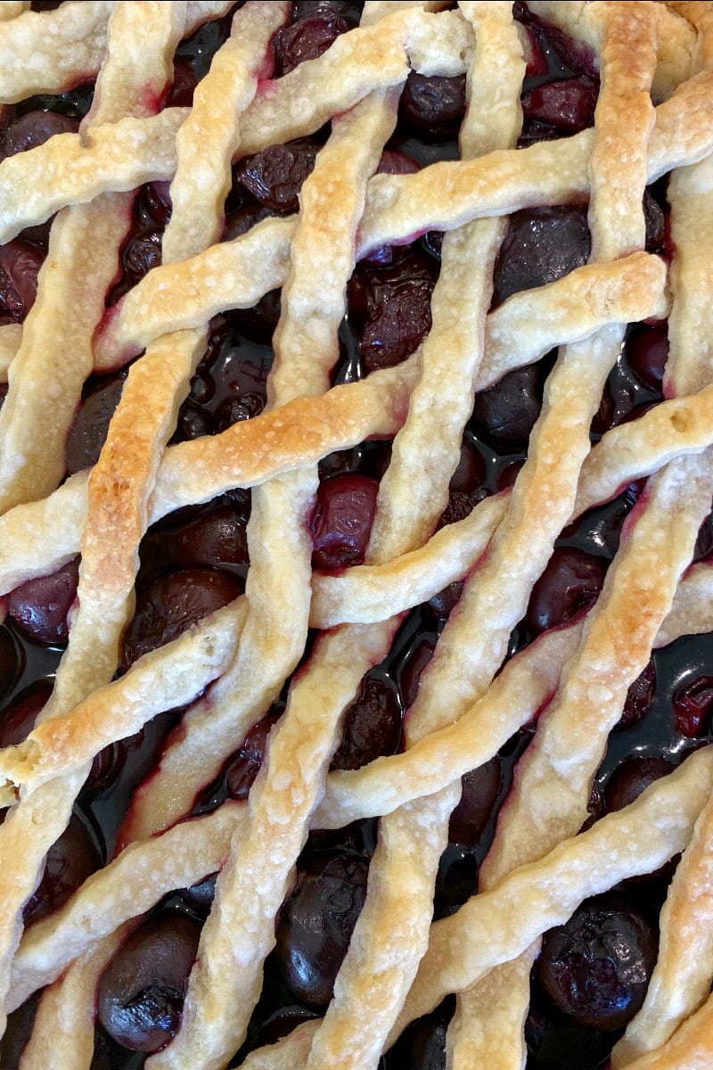 overhead shot of cherry pie with lattice crust topping