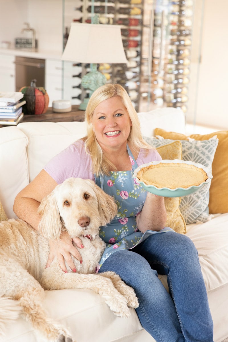 Hoosier Pie recipe from RecipeGirl.com #hoosier #pie #sugar #cream #pie #sugarcreampie #hoosierpie #indiana #recipe #RecipeGirl RecipeGirl and Tessie the labradoodle with pie