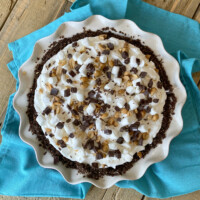 overhead shot of rocky road pie sitting on a teal blue napkin