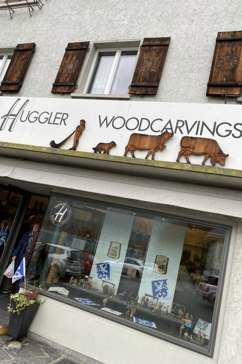 view of the front of the Huggler Woodcarvings shop.