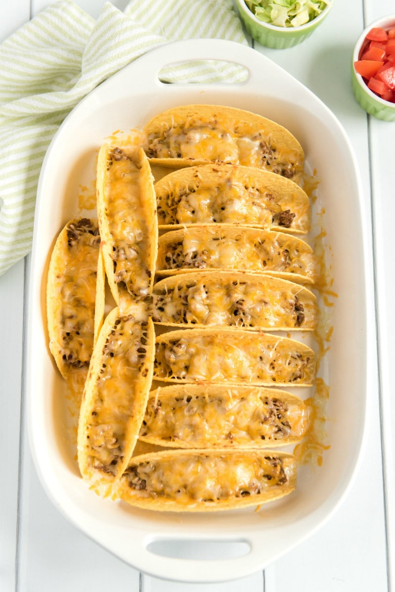Making Oven Baked Beef Tacos with melted cheese