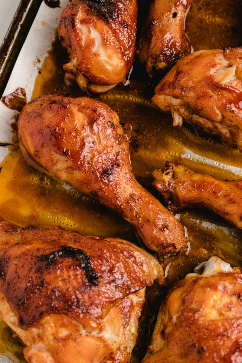 oven baked BBQ chicken on a baking sheet