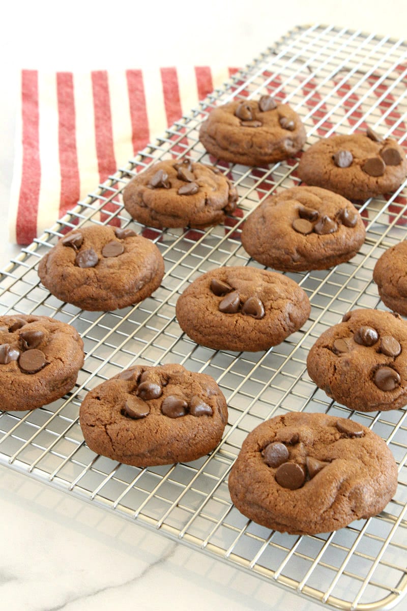 Chocolate Chocolate Chip Pudding Cookies on a cooling rack
