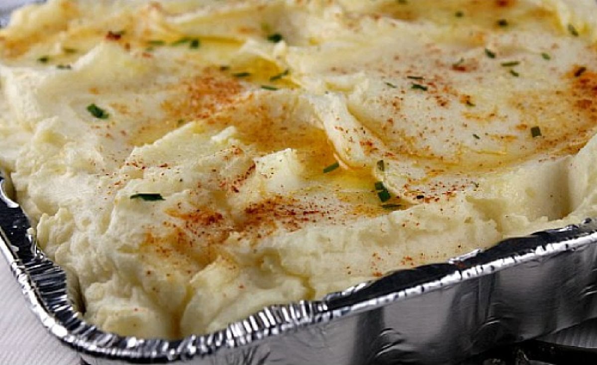 creamy oven baked mashed potatoes in foil dish