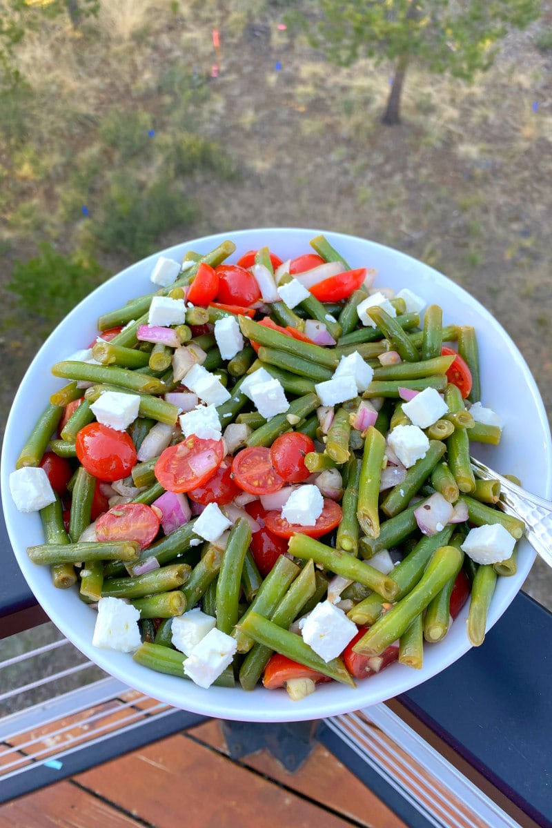 green beans salad in a white bowl