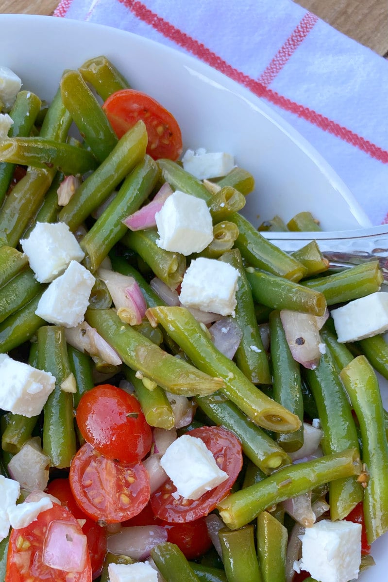 close up peek of green bean salad in a bowl