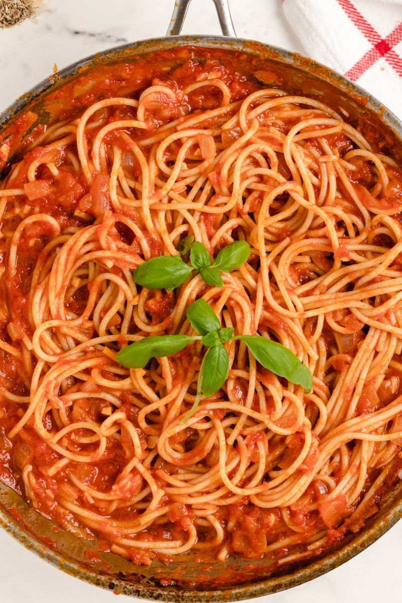 pasta pomodoro garnished with basil