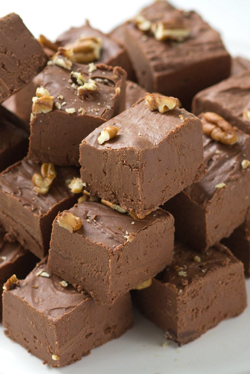 25 Best Fudge Recipes from RecipeGirl.com #best #fudge #recipes #chocolate #peanut #butter #peanutbutter #christmas stack of german chocolate fudge