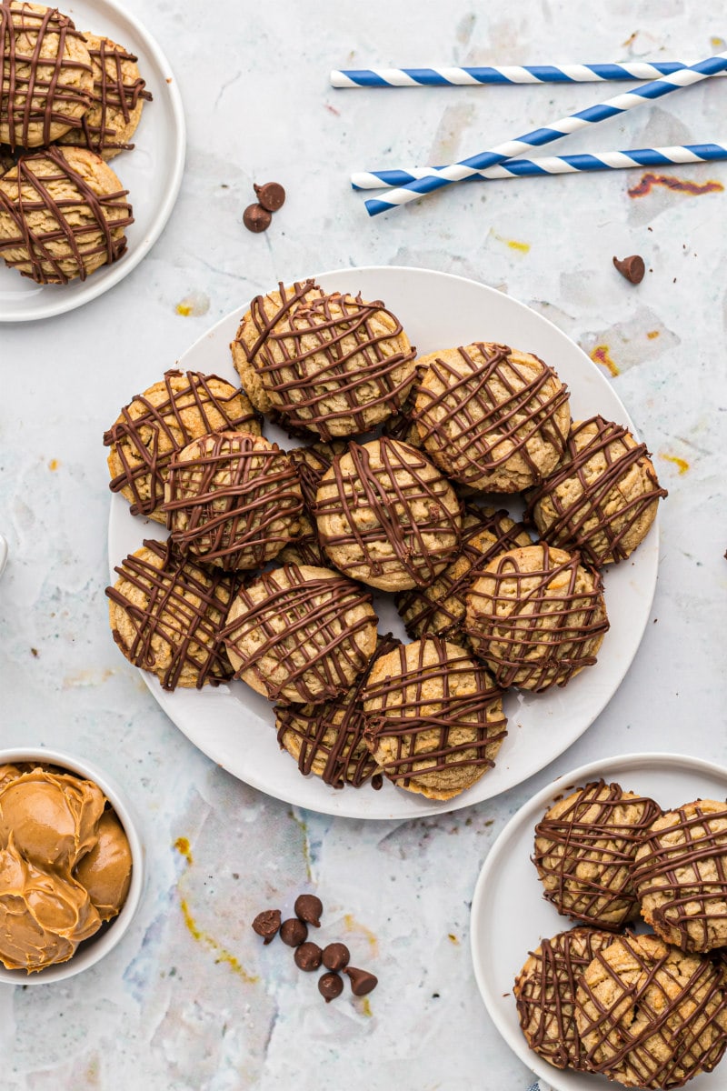 platter full of chocolate drizzled peanut butter cookies