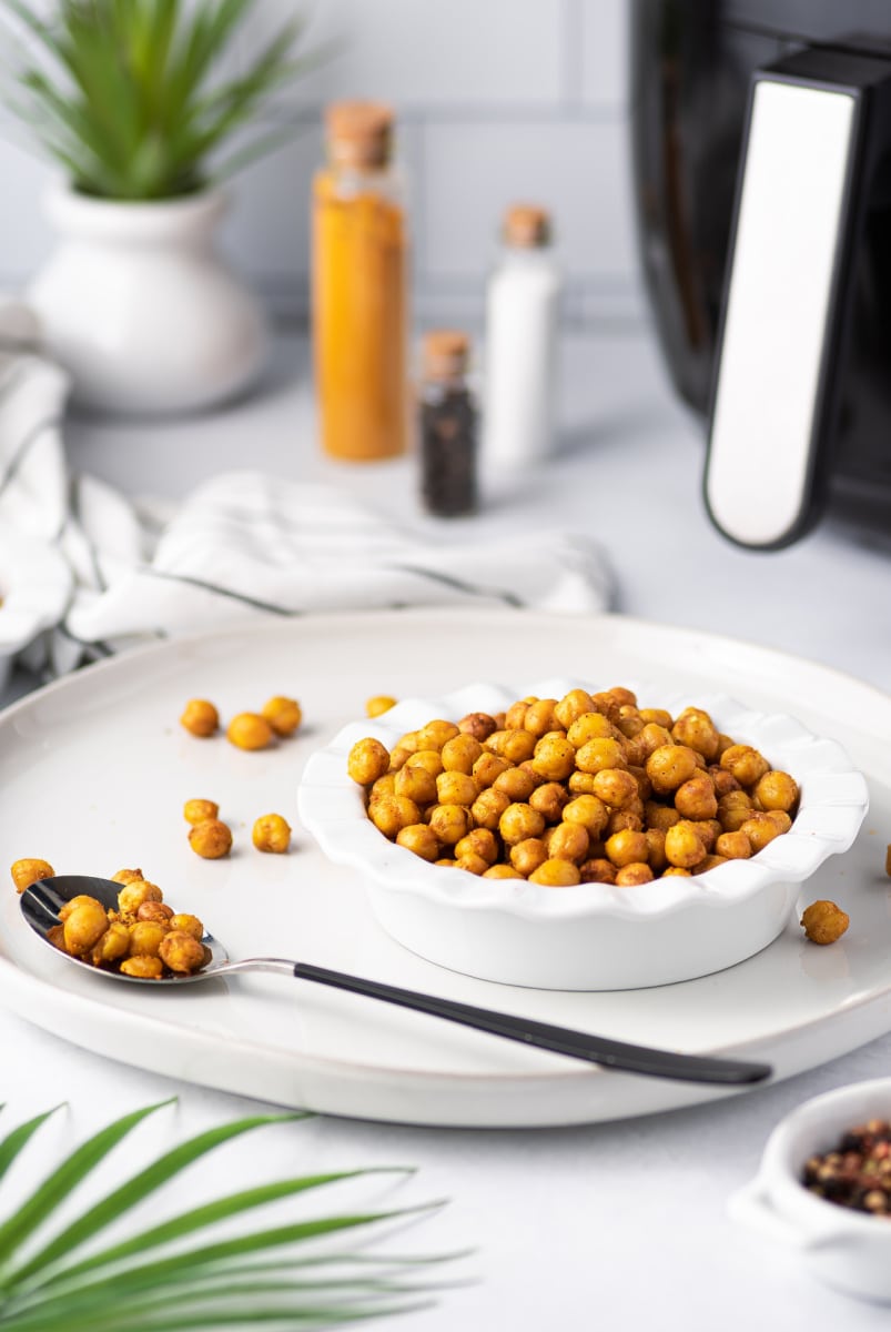 air fryer chickpeas in a bowl with a spoon