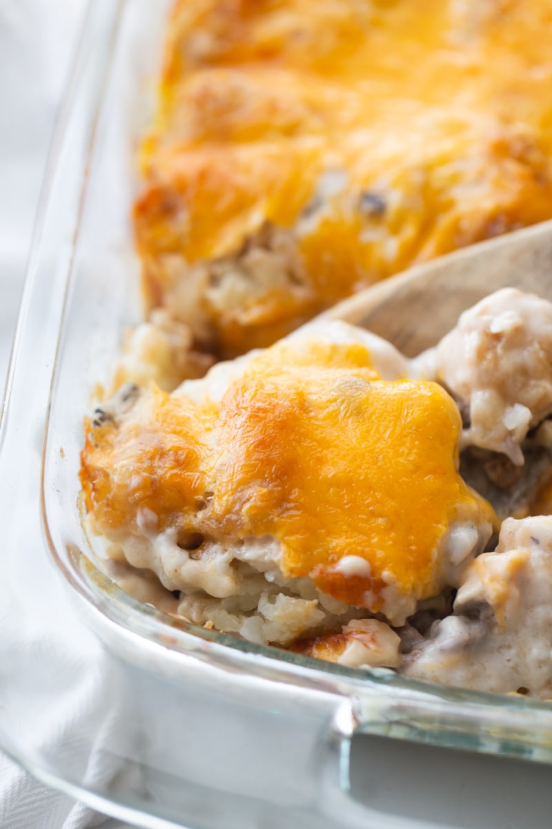 Easy Tater Tot Casserole recipe from RecipeGirl.com serving tater tot casserole