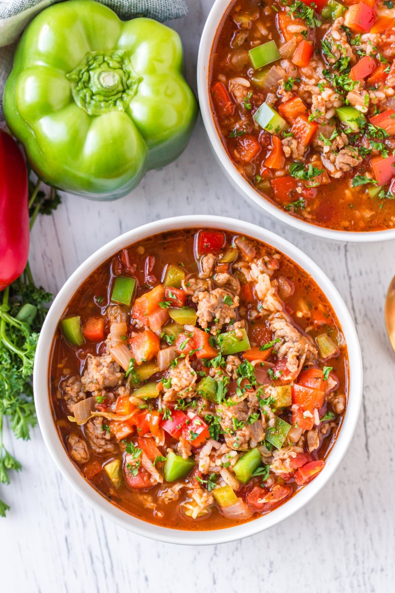 stuffed pepper soup in white bowls