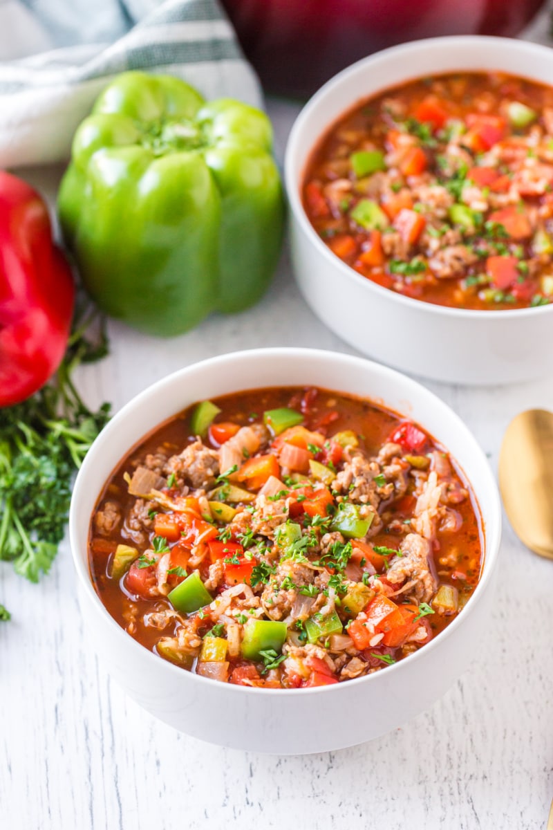 stuffed pepper soup in white bowls