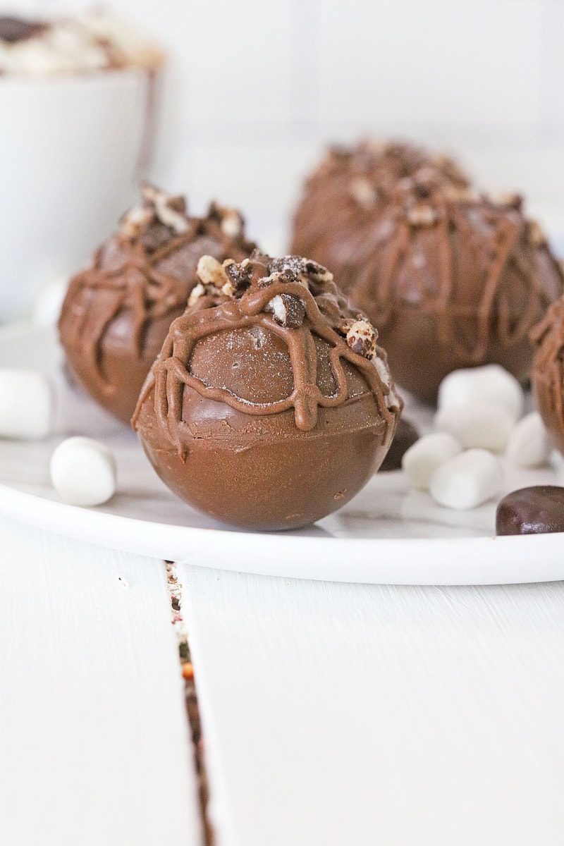 hot chocolate bombs on a white plate