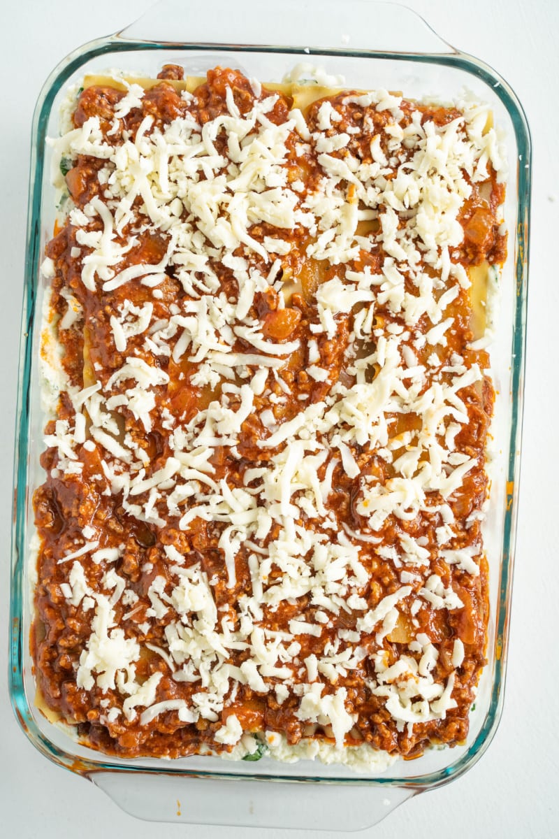 lasagna in casserole dish ready for oven