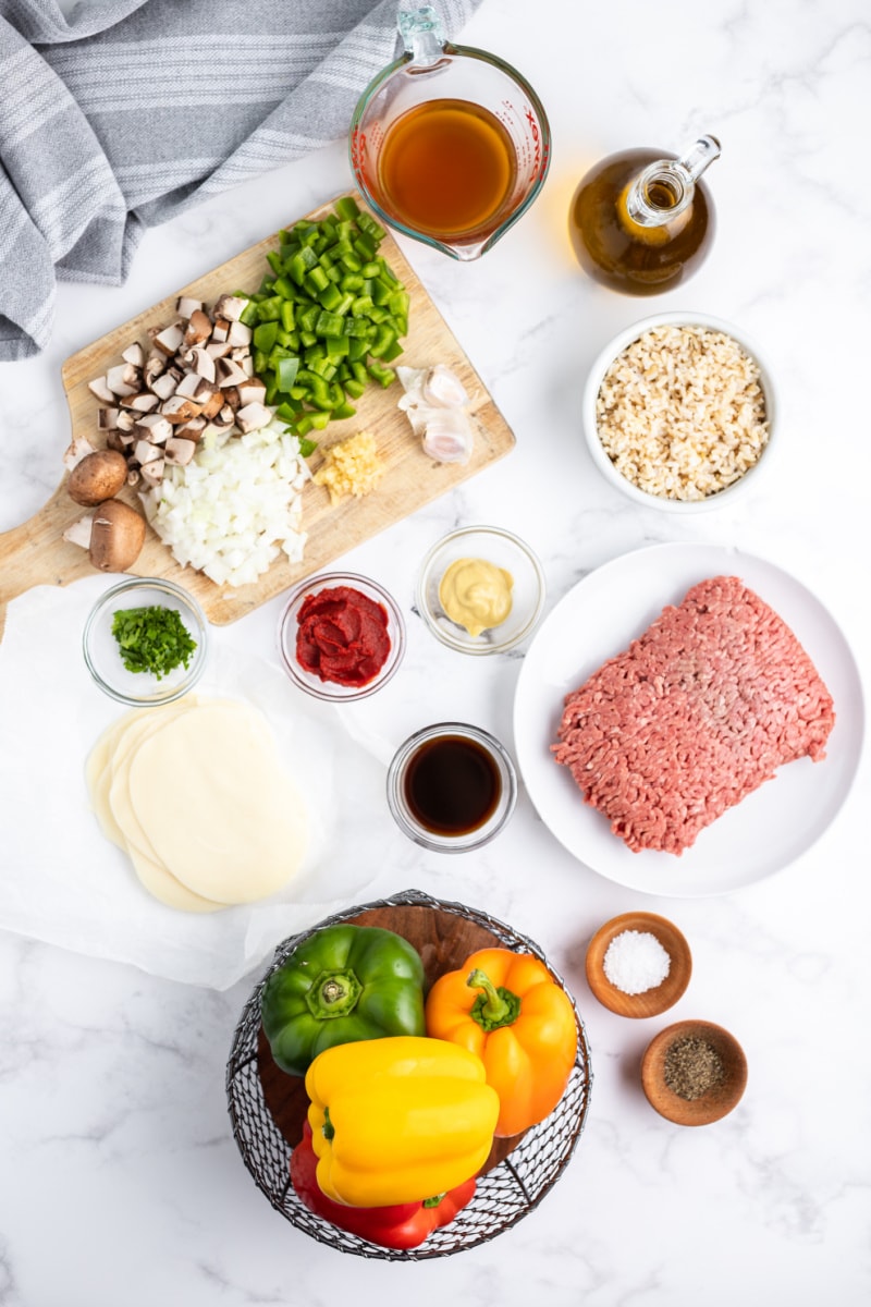 ingredients displayed for making philly cheesesteak stuffed peppers