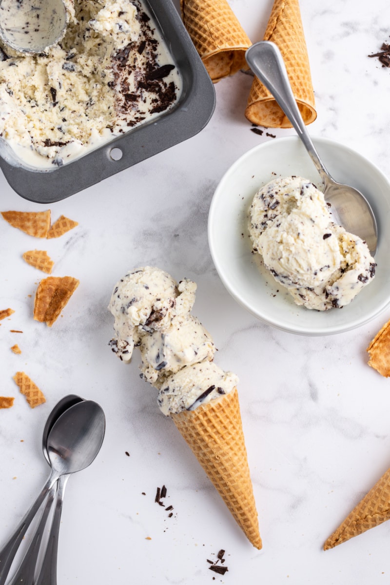 stracciatella gelato scooped in bowl and also on ice cream cone