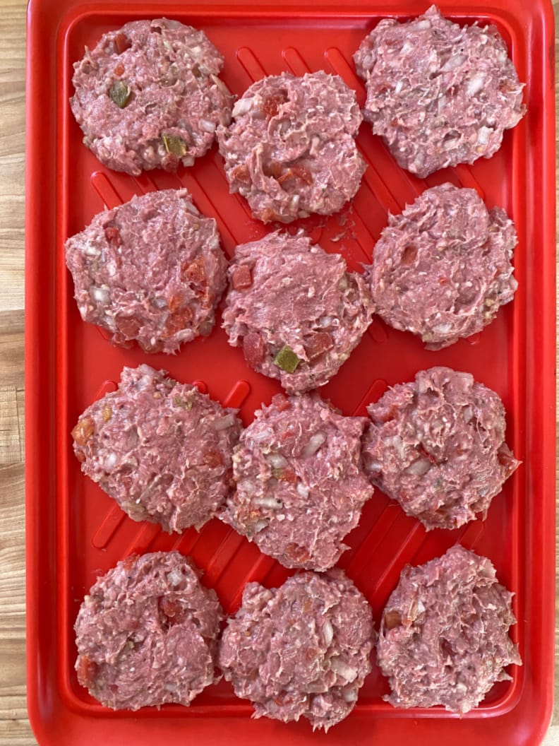 sliders on a platter ready for the grill