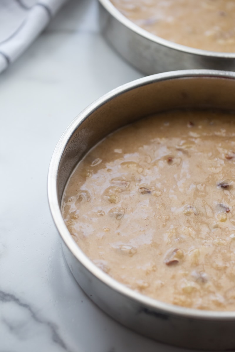 cake batter in two round pans