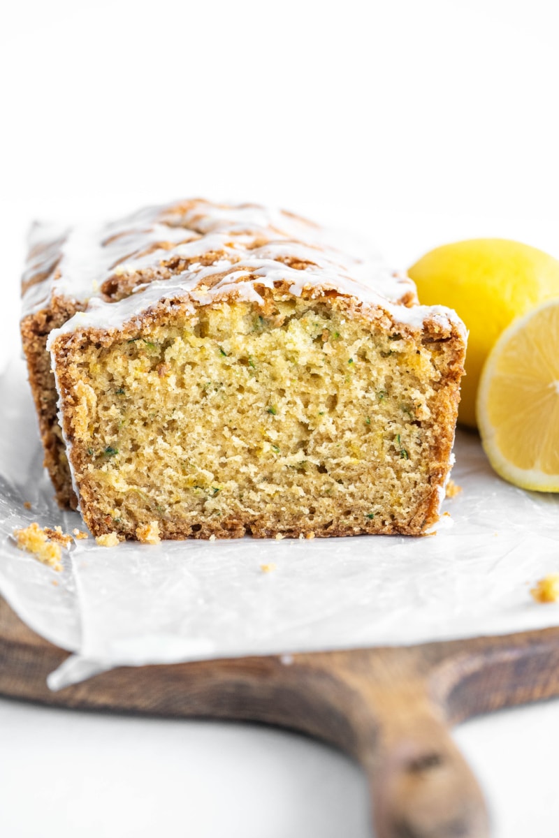 iced lemon zucchini bread cut open to see inside