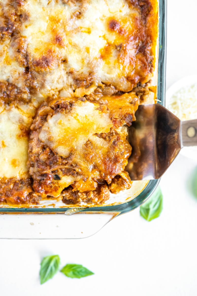 serving zucchini lasagna out of a pan