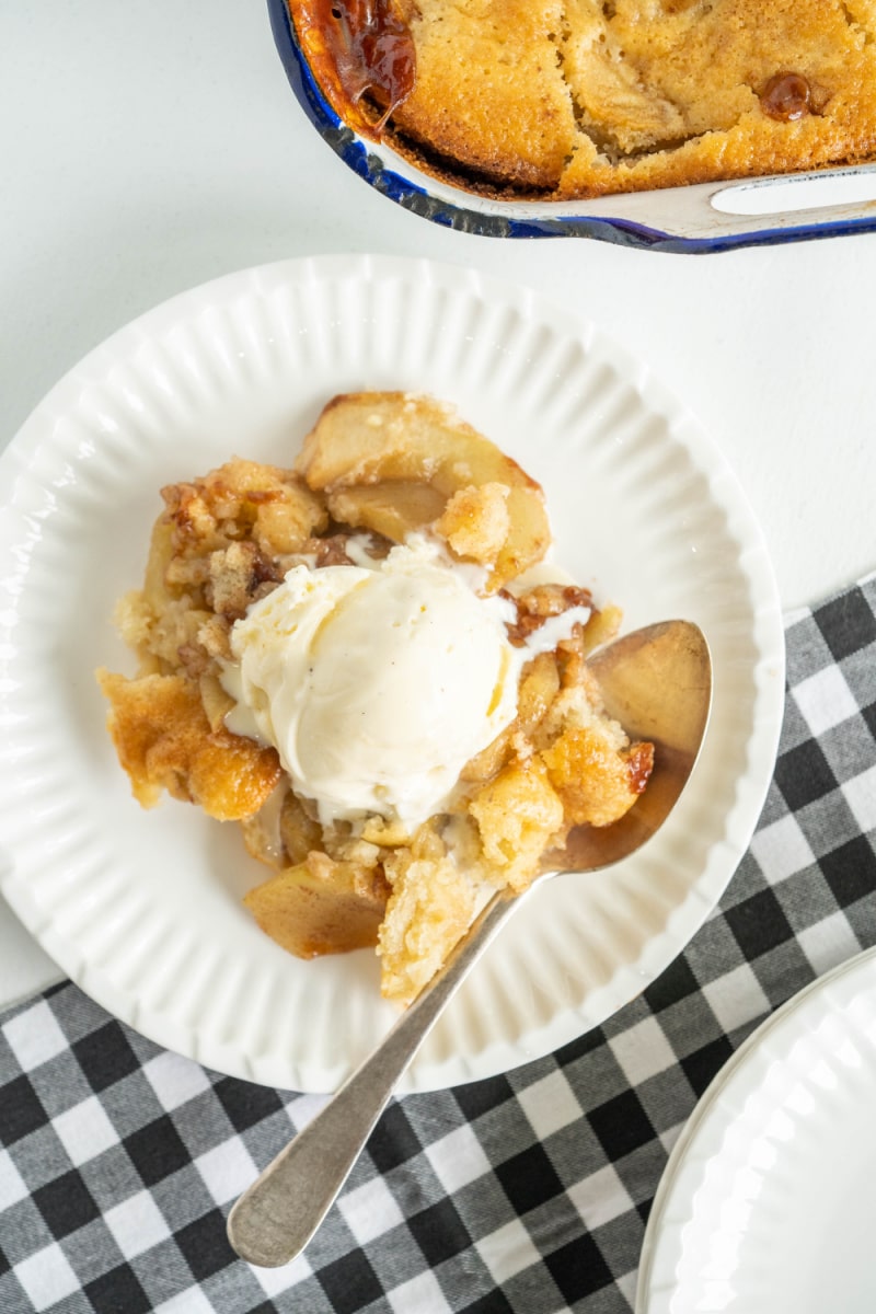 serving of apple cobbler with ice cream on top