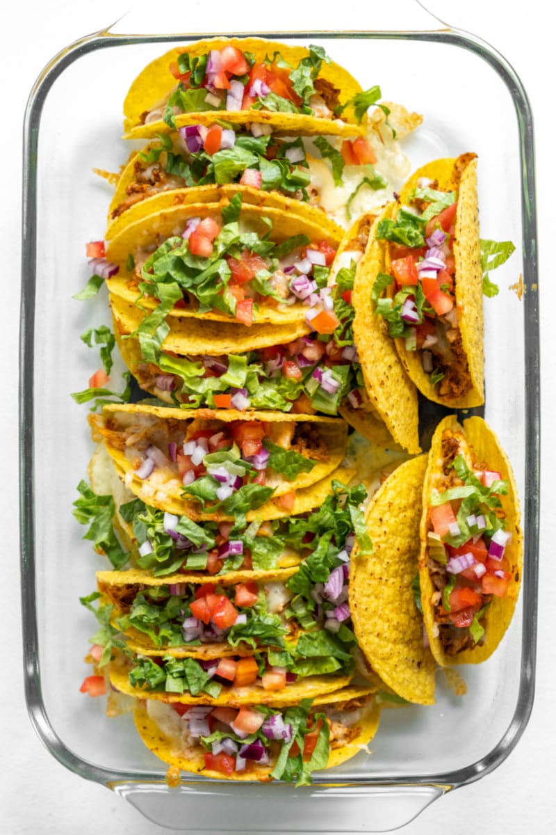 oven baked chicken tacos in a casserole dish