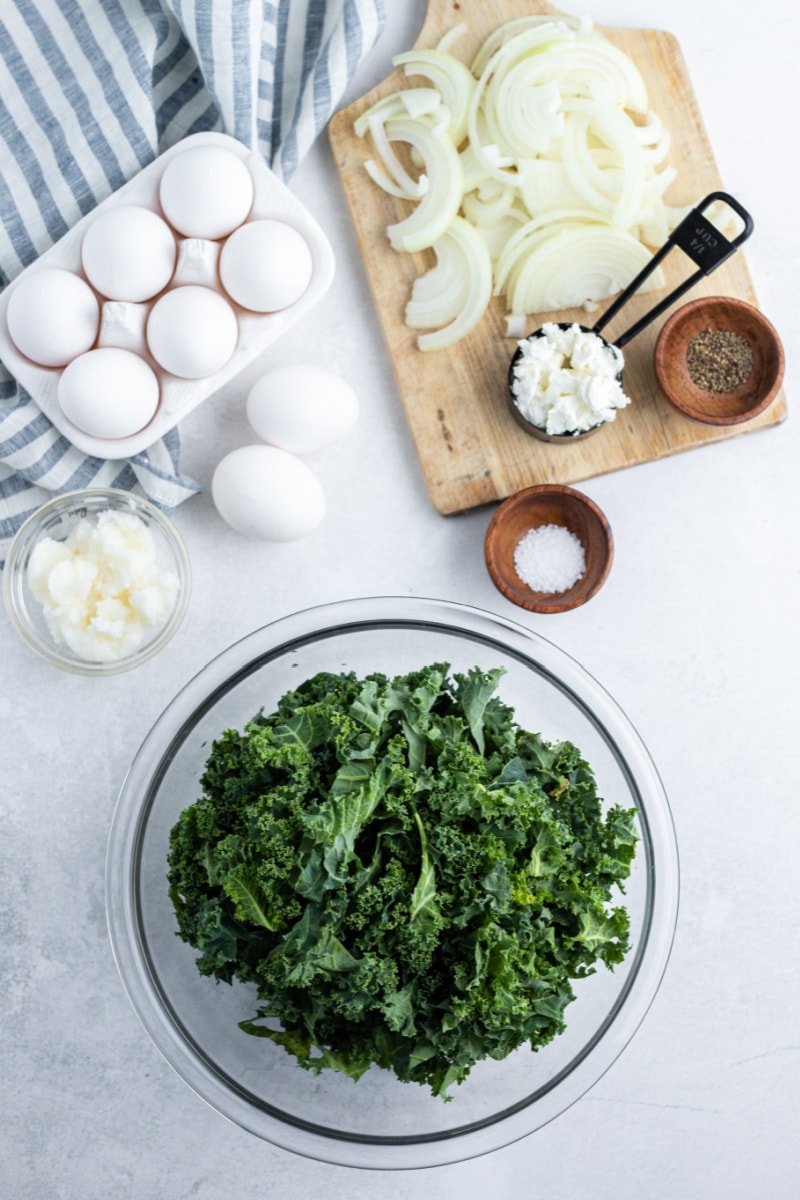 ingredients displayed for making kale and goat cheese frittata