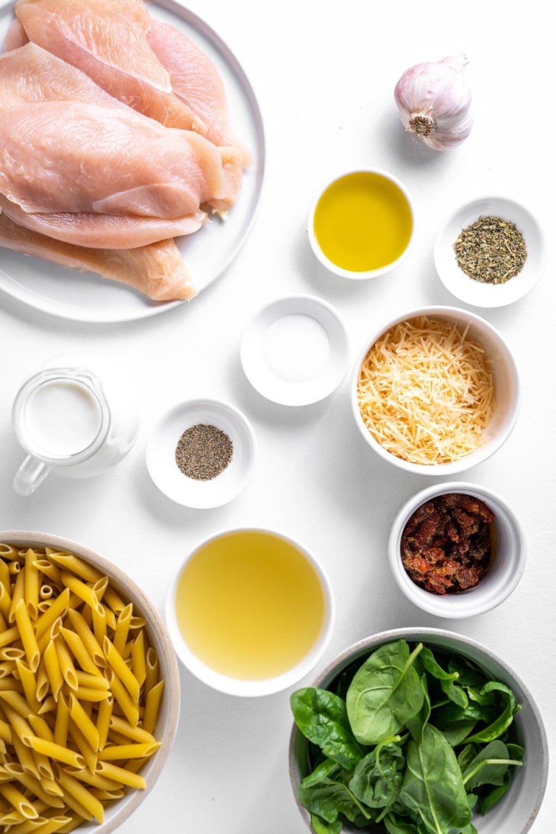 ingredients displayed for making tuscan chicken pasta