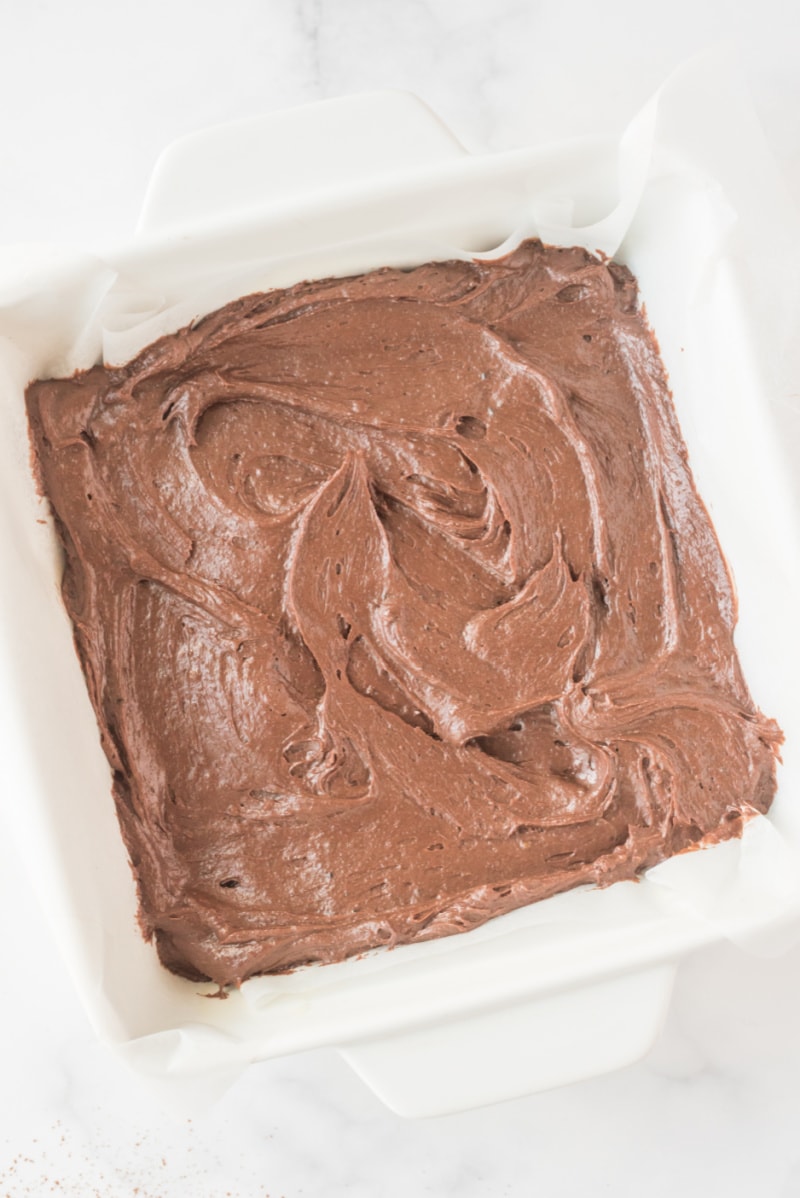 brownie batter in a square pan