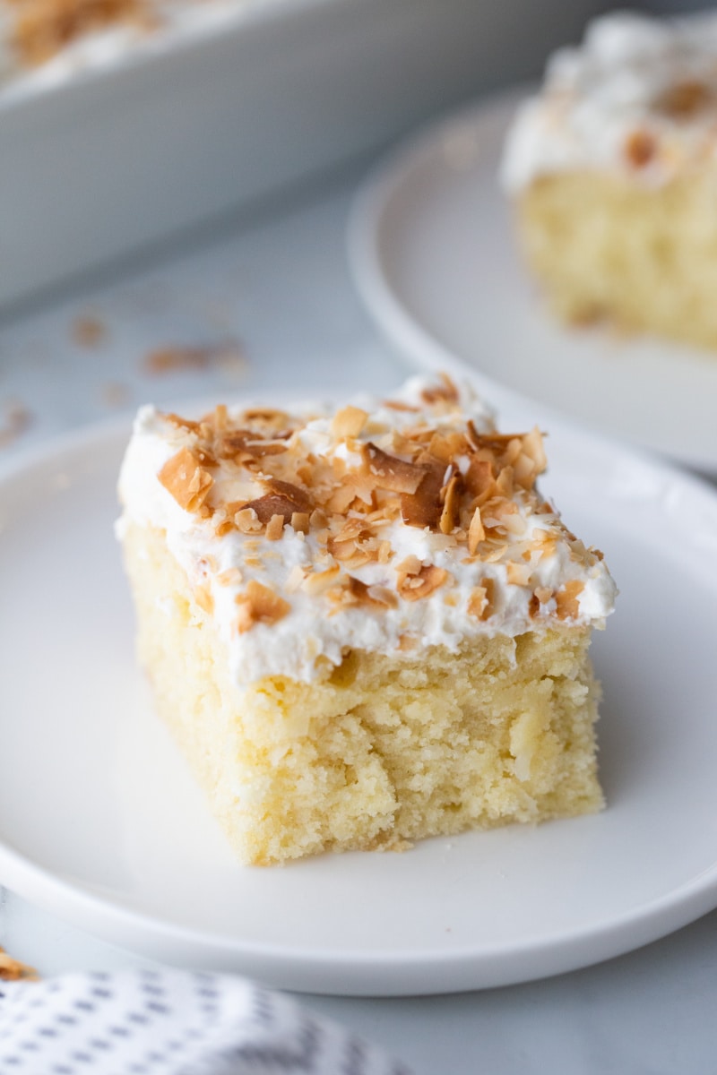 slice of coconut cake on plate