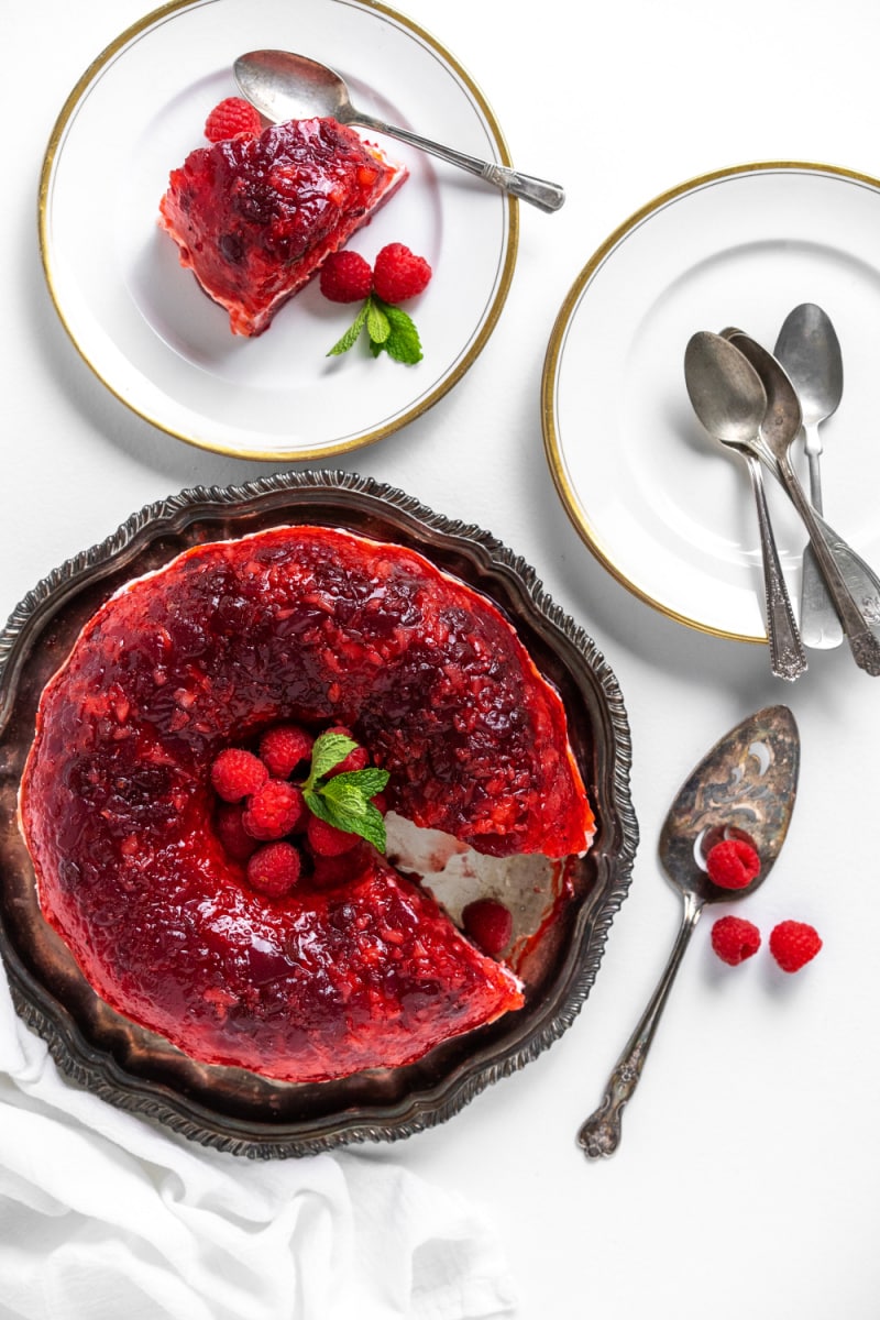 cranberry jello ring with slice taken out and slice on plate