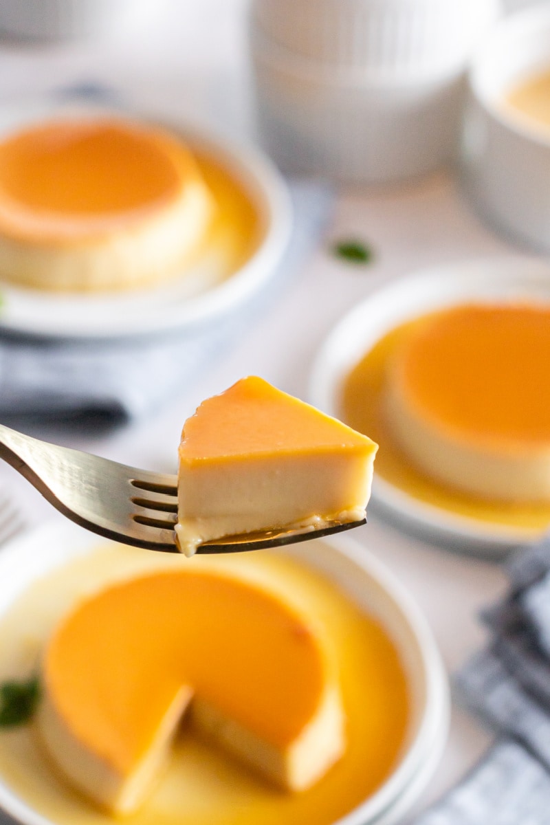 fork holding bite of flan