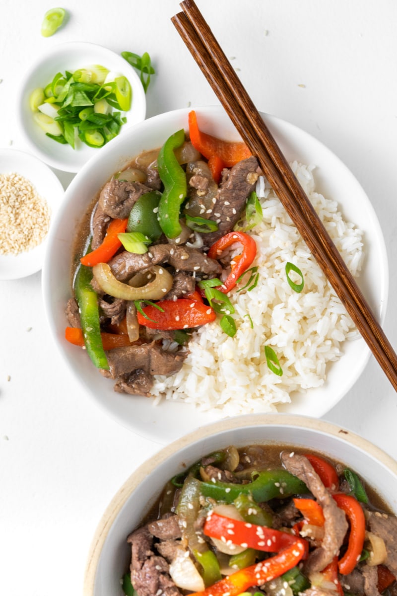 pepper steak served in bowl with rice