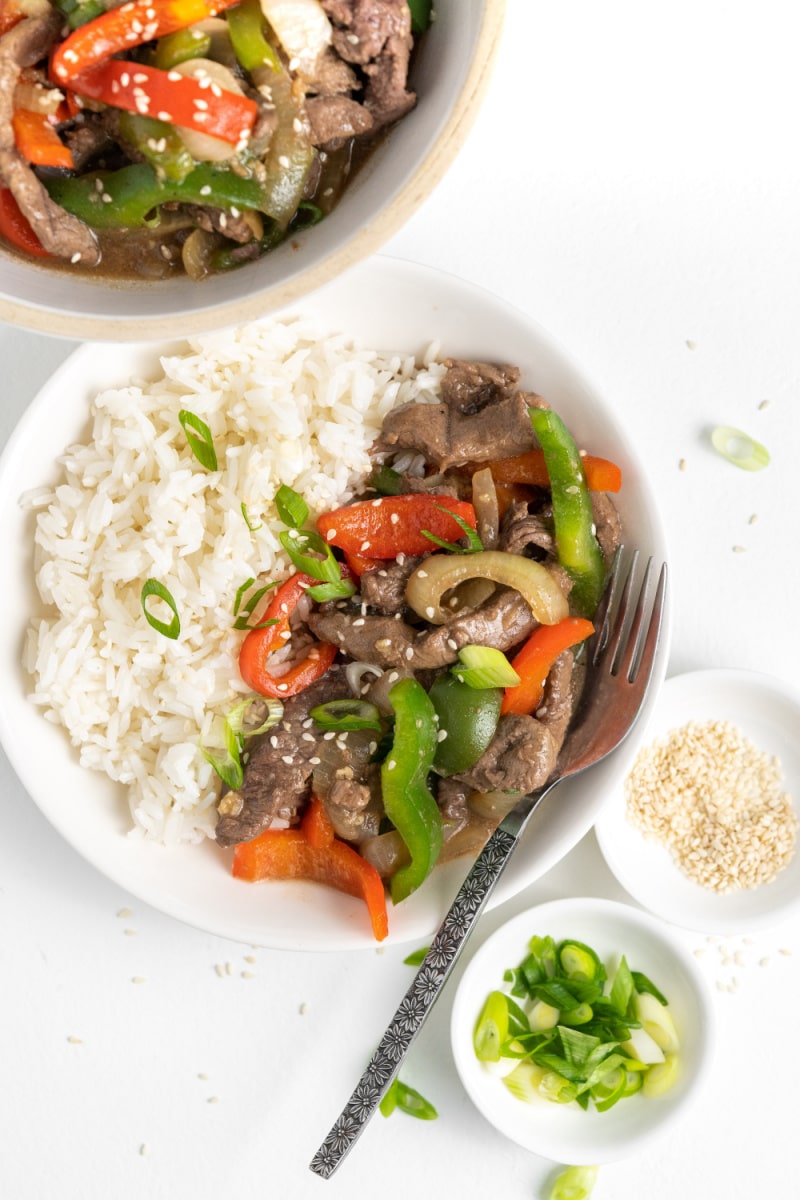 pepper steak served in bowl with rice