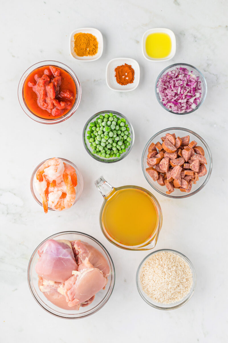 ingredients displayed for making slow cooker paella