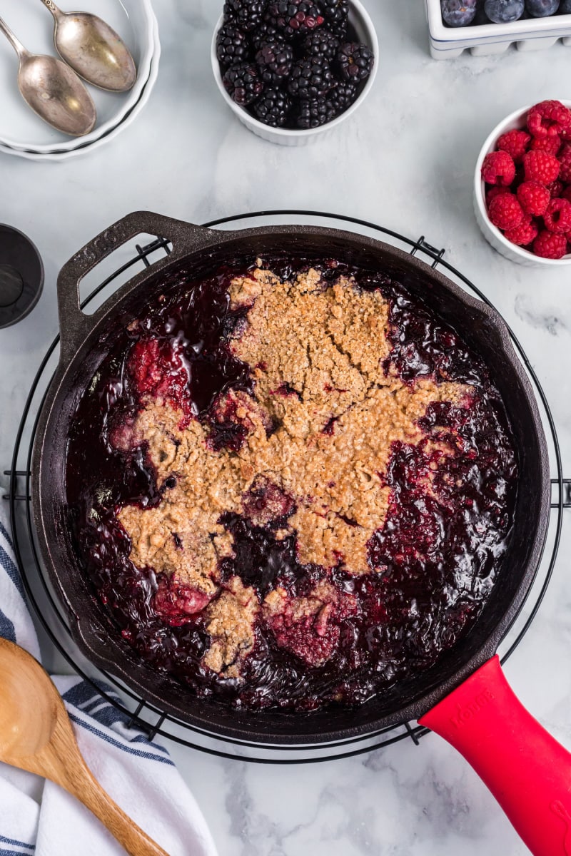 berry crumble in a cast iron skillet