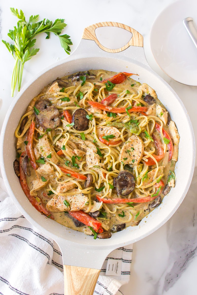 cajun chicken pasta in a white pot