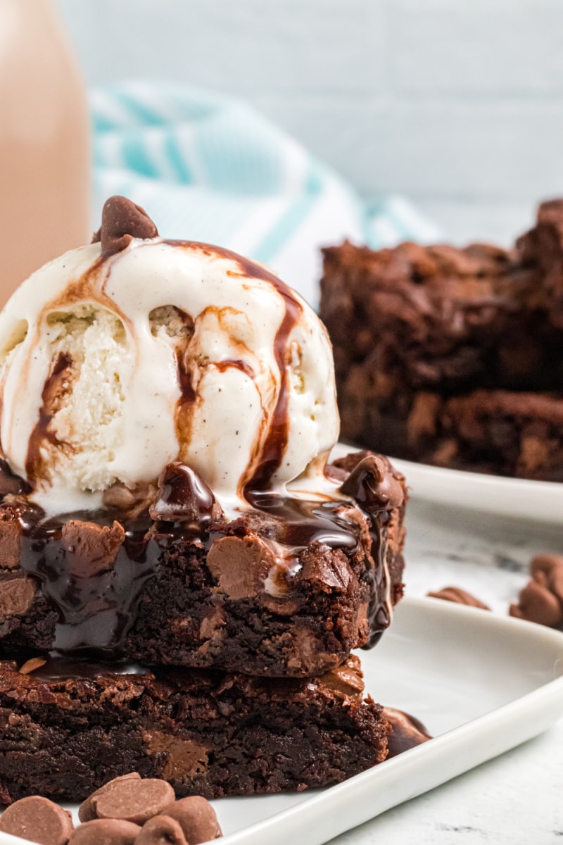 brownie with scoop of vanilla ice cream on top