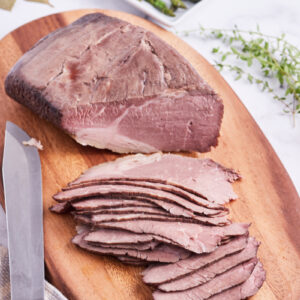 roast beef on board cut into slices