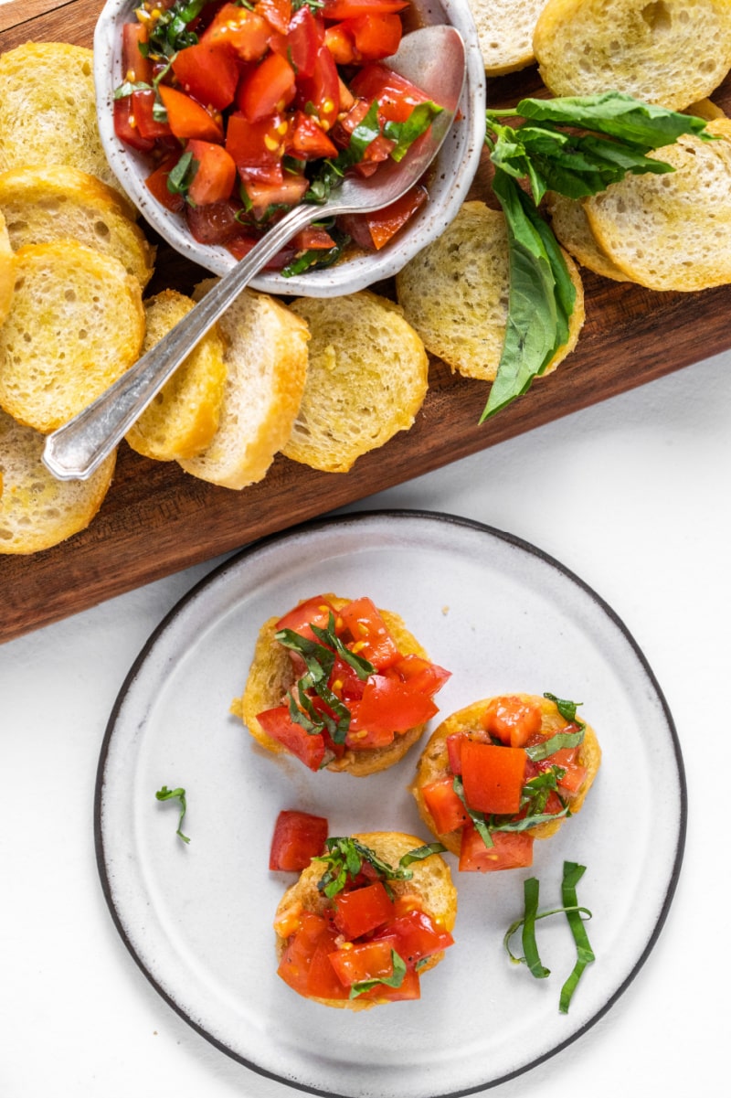 three pieces of bruschetta on plate